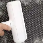 Petti Roller cleaning sofa